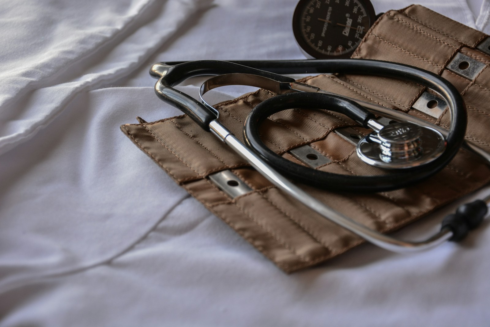 health black stethoscope with brown leather case